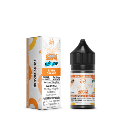 Flavour Beast Sunny Orange e-liquid bottle placed next to fresh oranges and orange slices, showcasing its vibrant citrus flavor.