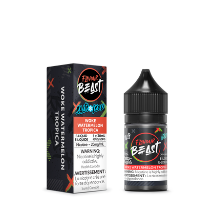 Flavour Beast Woke Watermelon Tropica with fresh watermelon slices, pineapple chunks, and mango cubes, highlighting its tropical, fruity taste.