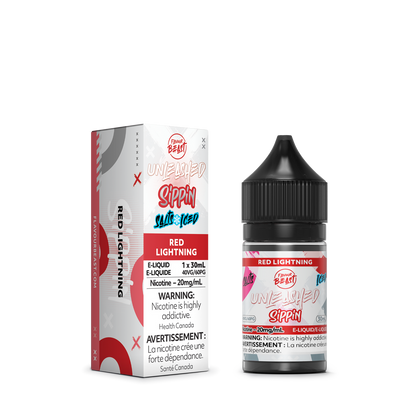 Flavour Beast Red Lightning e-liquid bottle placed with bright citrus fruits, emphasizing its bold and invigorating flavor profile.