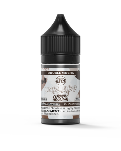 Flavour Beast Double Mocha e-liquid bottle placed next to a steaming cup of coffee and a chocolate bar, emphasizing its rich and indulgent flavor profile.