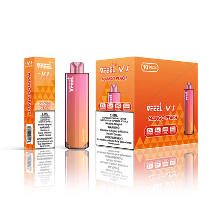 VFEEL V1 Mango Peach placed with fresh mango slices and peach halves, emphasizing its sweet and tropical essence.