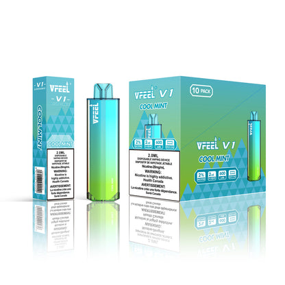 VFEEL V1 Cool Mint placed with fresh mint leaves and icy elements, emphasizing its clean and refreshing essence.